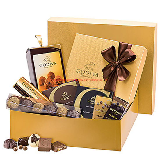 Confezione regalo di lusso in carta color oro con logo personalizzato