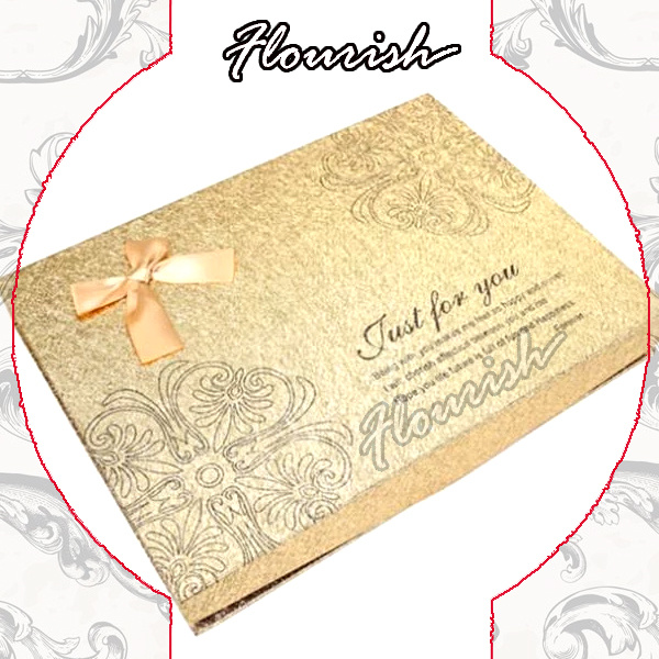 Confezione regalo a sorpresa di compleanno in carta patinata dorata a caldo